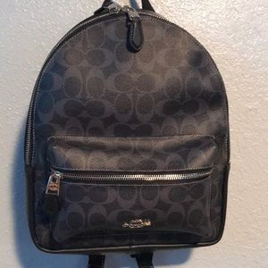 New without tags. Dark blue Coach backpack